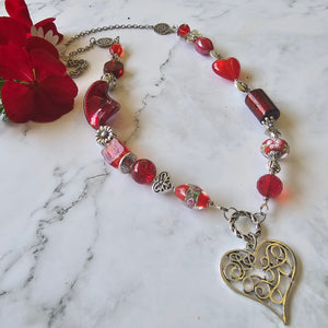 Long red beaded necklace