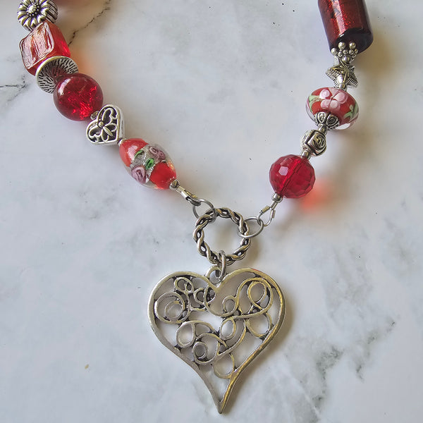 Long red beaded necklace