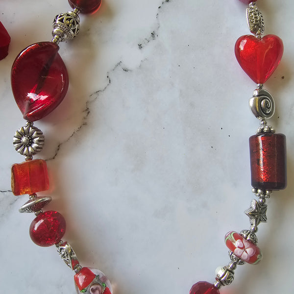 Long red beaded necklace