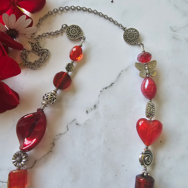 Long red beaded necklace