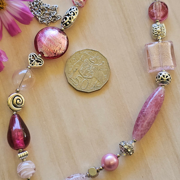 Long pink beaded necklace