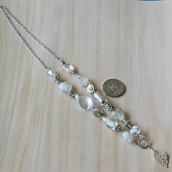 Long white beaded necklace